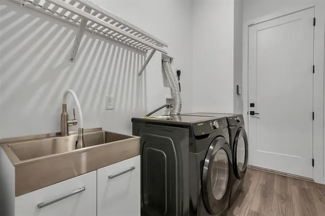a utility room with dryer and washer