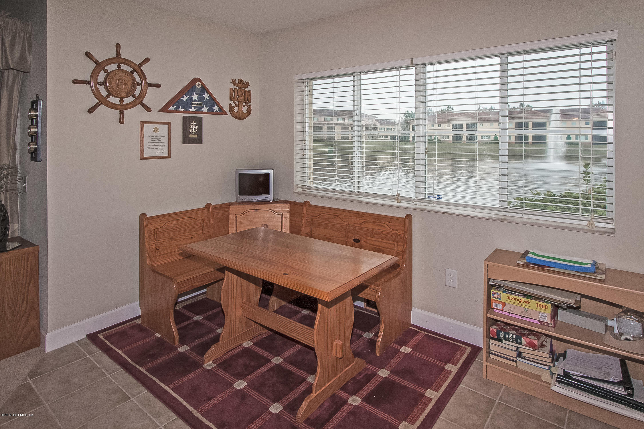 9745 Touchton Road, Unit 3103 Jacksonville, FL 32246 - Photo 11 of 20 a room with a table and a window