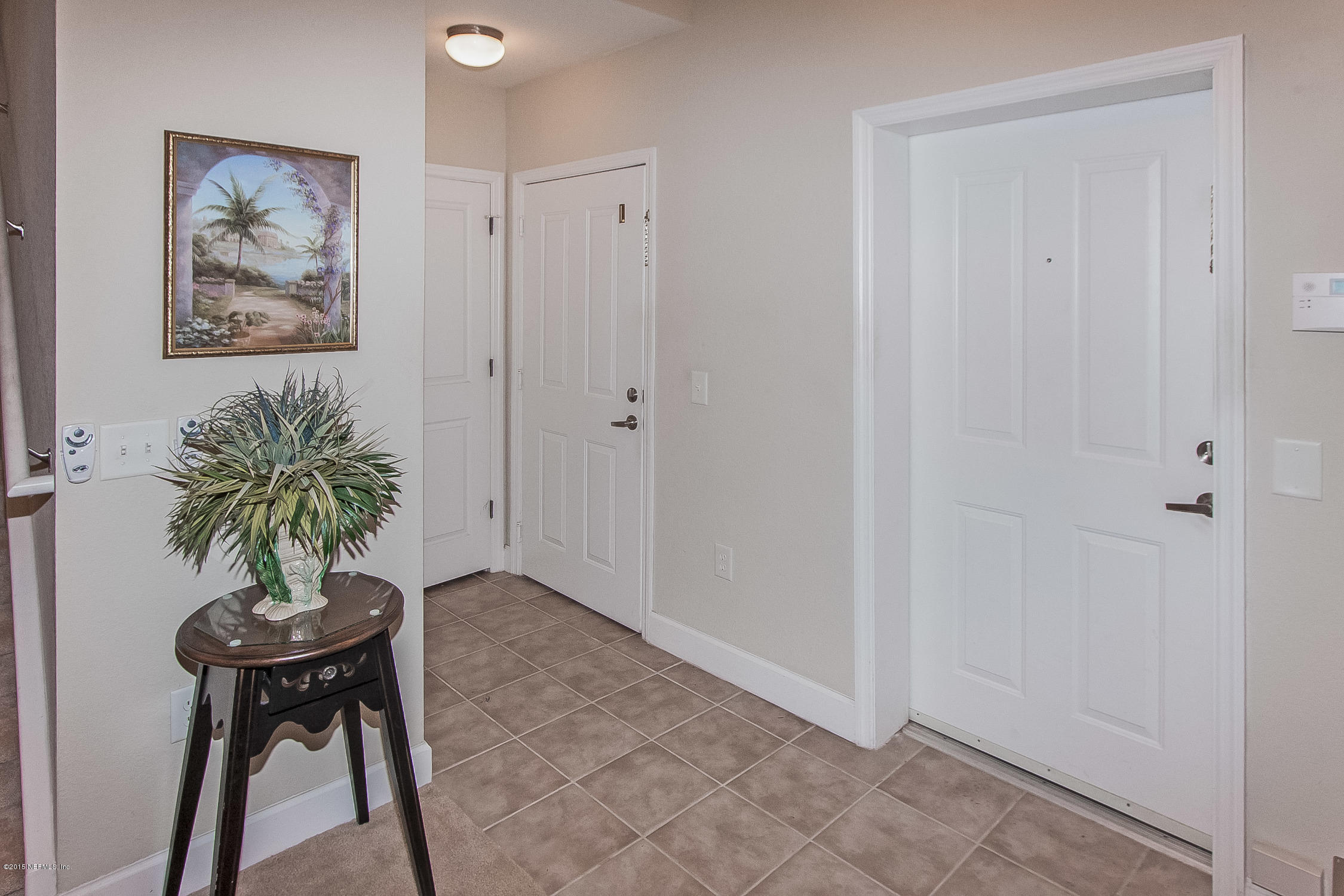 9745 Touchton Road, Unit 3103 Jacksonville, FL 32246 - Photo 15 of 20 a workspace room with furniture and potted plant