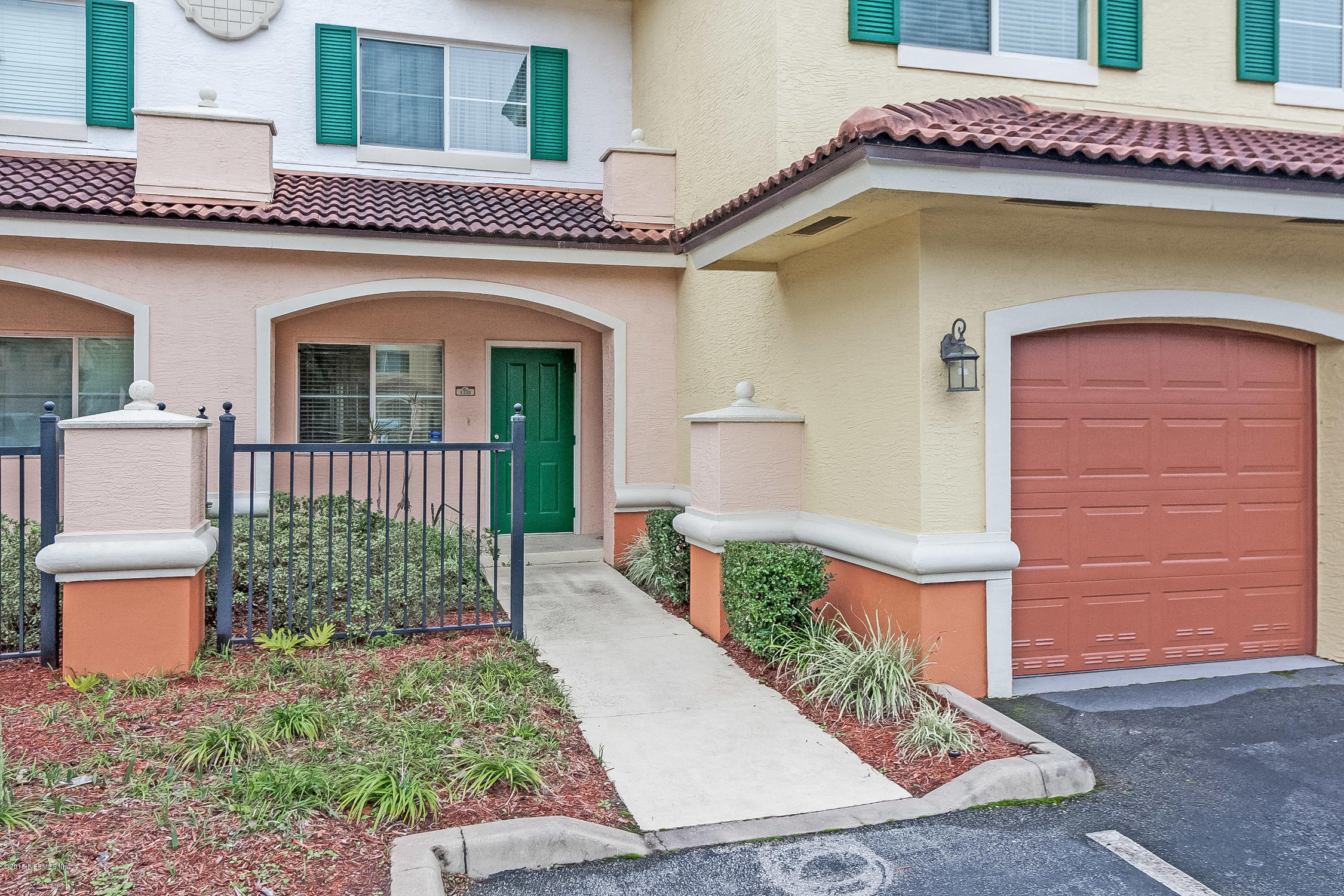 9745 Touchton Road, Unit 3103 Jacksonville, FL 32246 - Photo 16 of 20 a front view of a house with a yard
