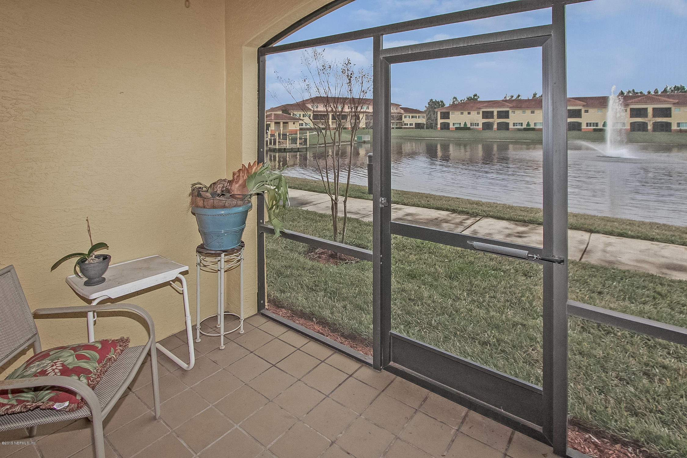 9745 Touchton Road, Unit 3103 Jacksonville, FL 32246 - Photo 6 of 20 a view of a room with a glass door