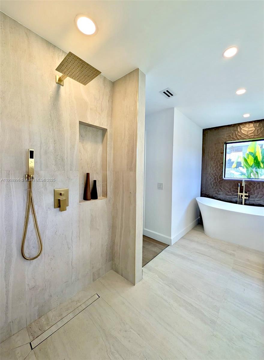 4108 Cedar Creek Road Boca Raton, FL 33487 - Photo 17 of 36 a view of a bathroom with a shower