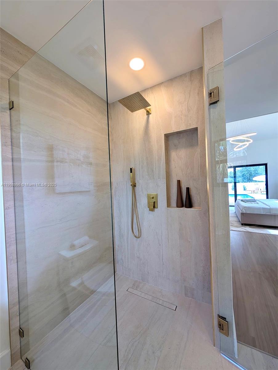 4108 Cedar Creek Road Boca Raton, FL 33487 - Photo 18 of 36 a bathroom with a shower