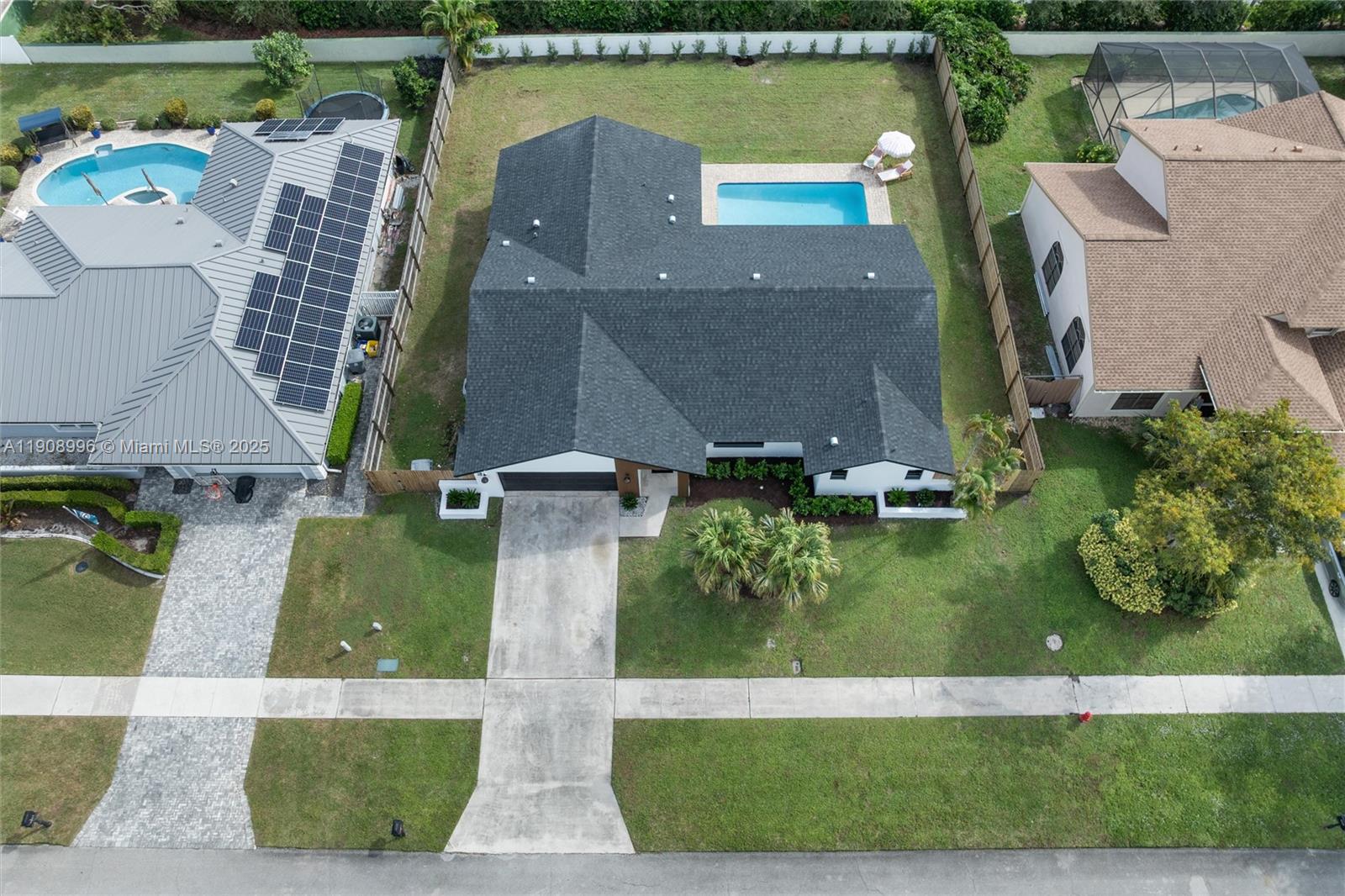 4108 Cedar Creek Road Boca Raton, FL 33487 - Photo 31 of 36 an aerial view of a house with a lake view