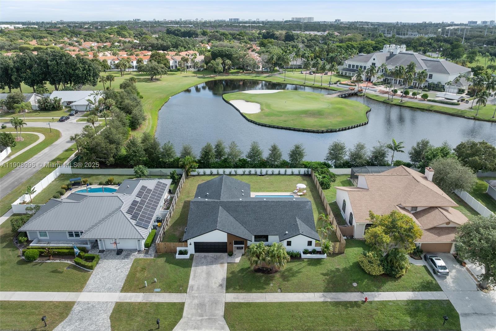 4108 Cedar Creek Road Boca Raton, FL 33487 - Photo 32 of 36 an aerial view of a house with garden space and lake view
