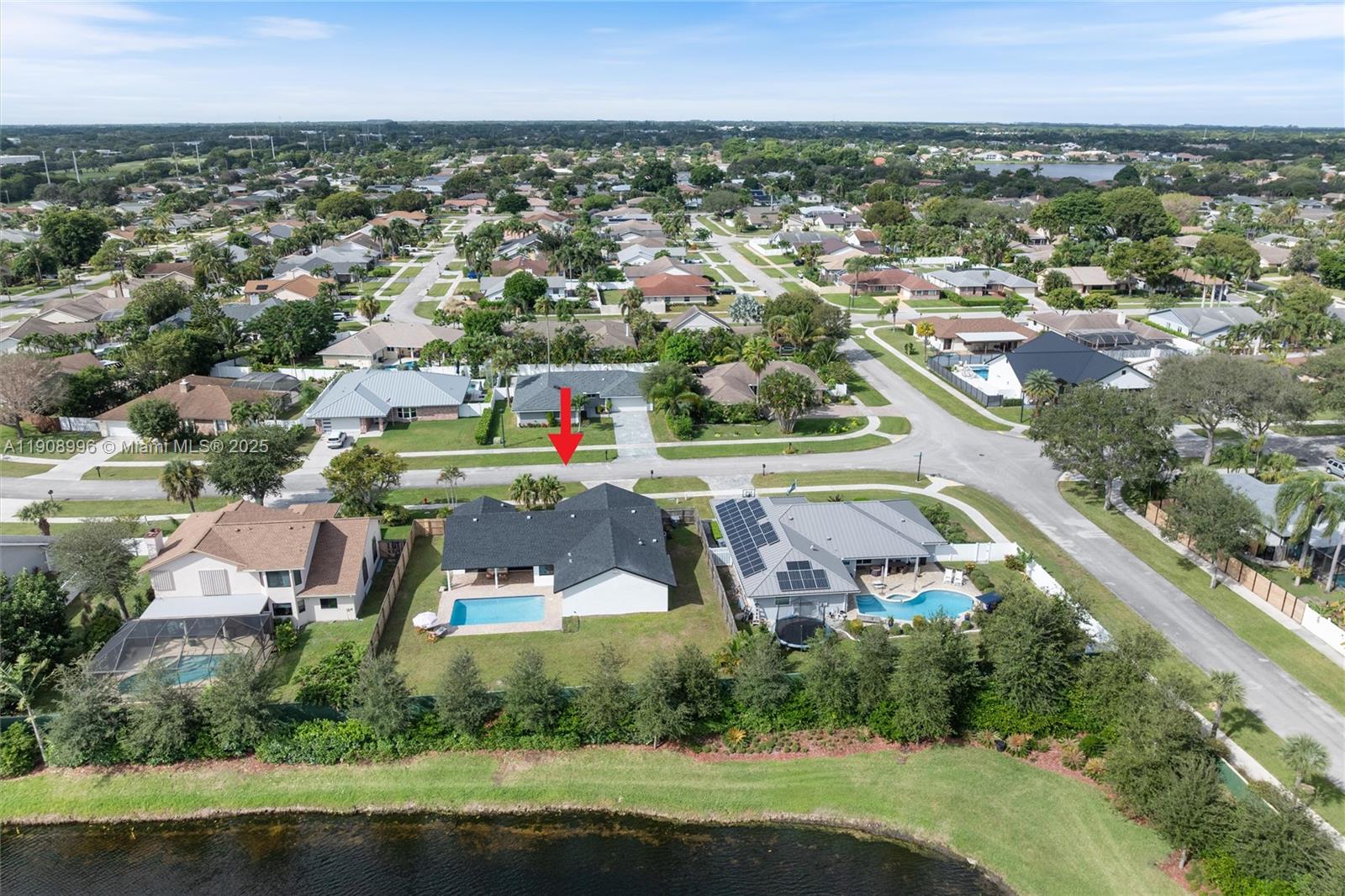 4108 Cedar Creek Road Boca Raton, FL 33487 - Photo 33 of 36 an aerial view of residential houses with outdoor space and river