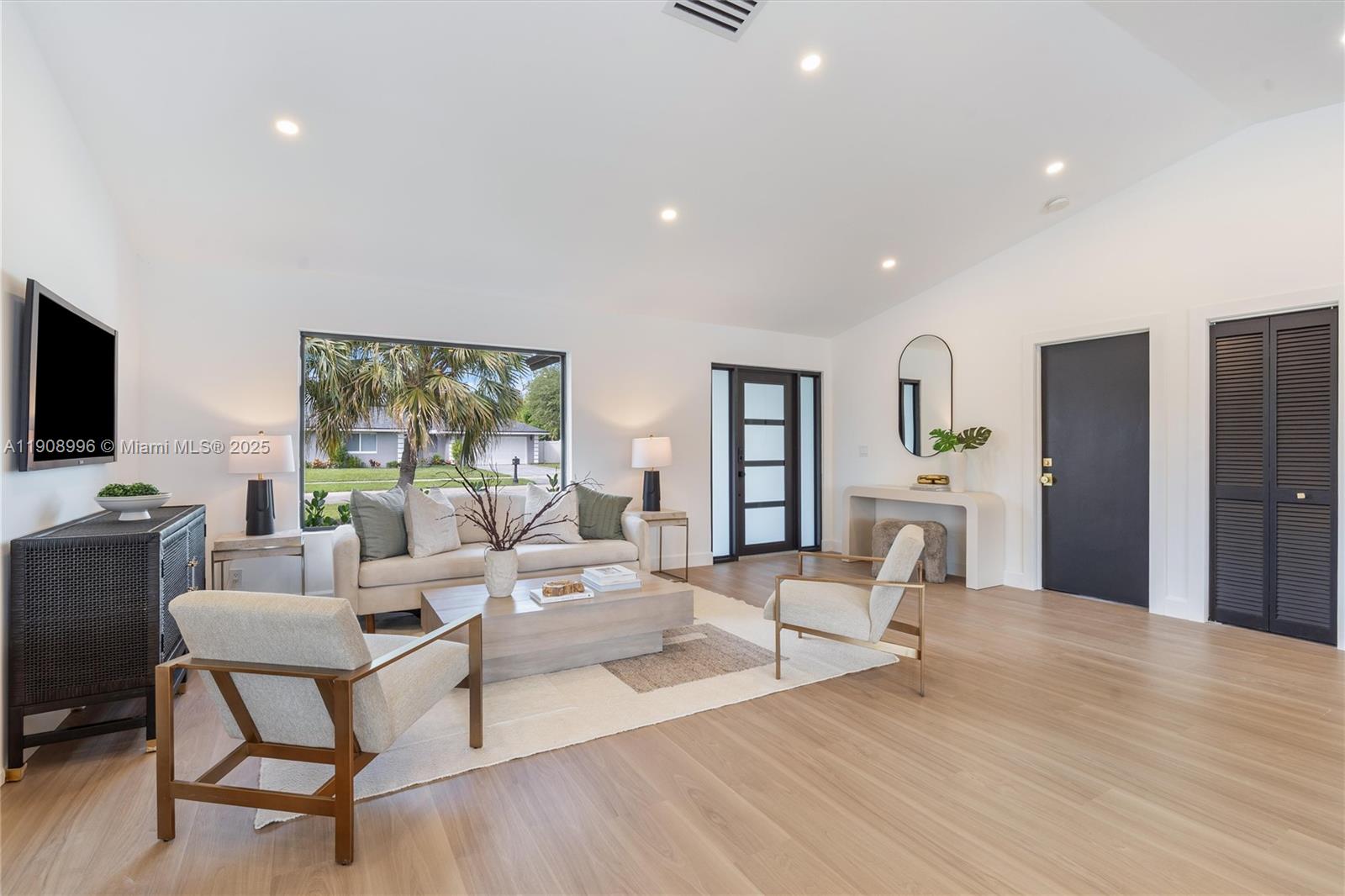 4108 Cedar Creek Road Boca Raton, FL 33487 - Photo 6 of 36 a living room with fireplace furniture and a flat screen tv