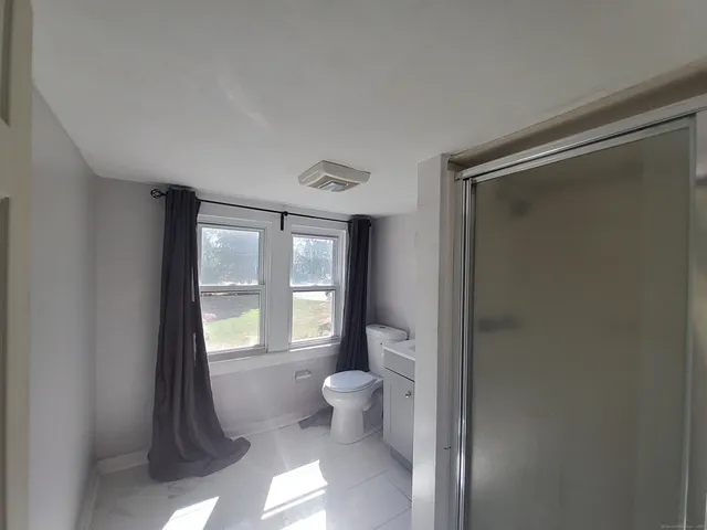 a bathroom with a toilet