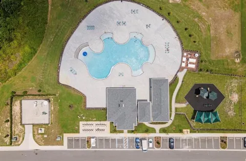 an aerial view of a swimming pool