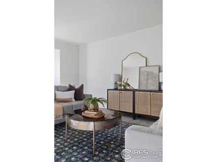 a living room with furniture and window