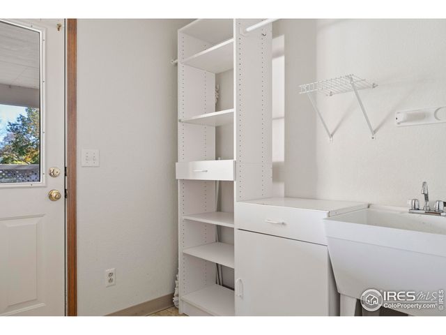 a view of cabinets with wooden floor