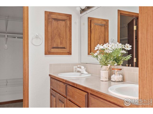 a bathroom with mirror and