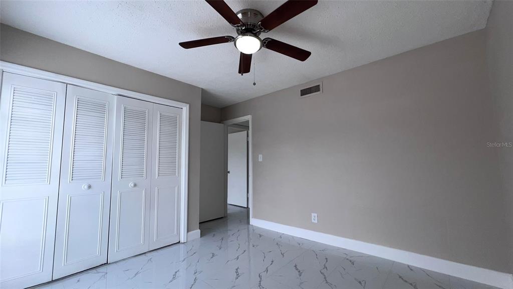 305 Wymore Road, Unit 203 Altamonte Springs, FL 32714 - Photo 13 of 21 wooden floor in an empty room