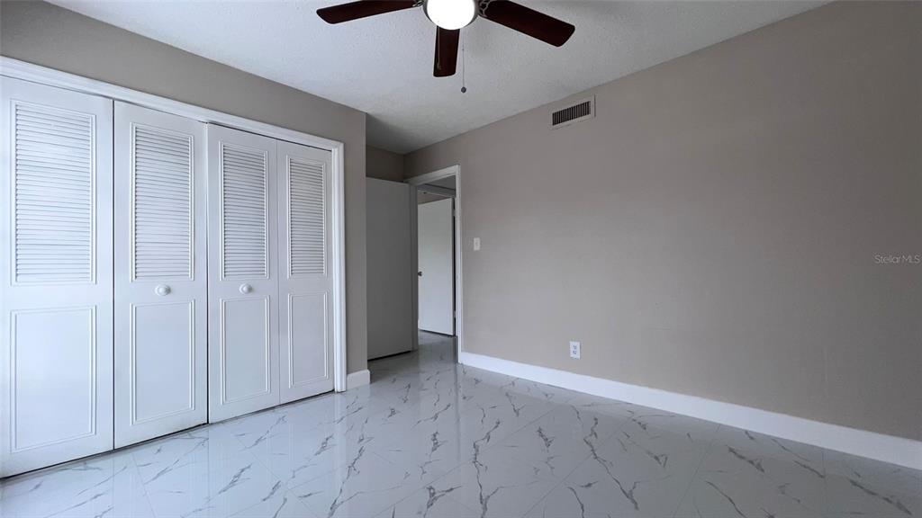305 Wymore Road, Unit 203 Altamonte Springs, FL 32714 - Photo 14 of 21 wooden floor in an empty room