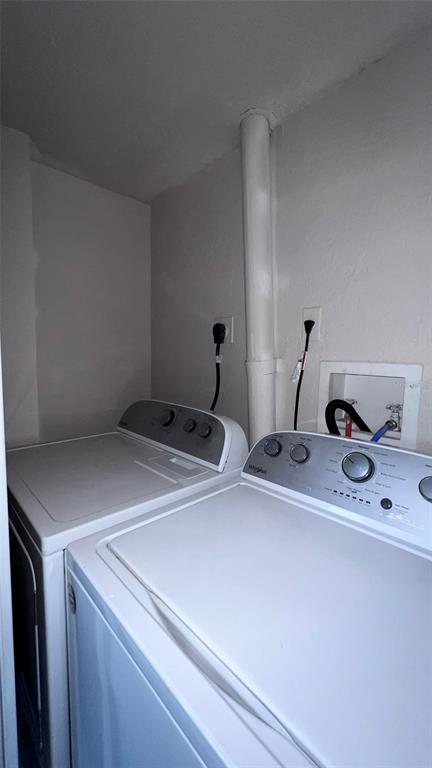 305 Wymore Road, Unit 203 Altamonte Springs, FL 32714 - Photo 20 of 21 a utility room with dryer and washer