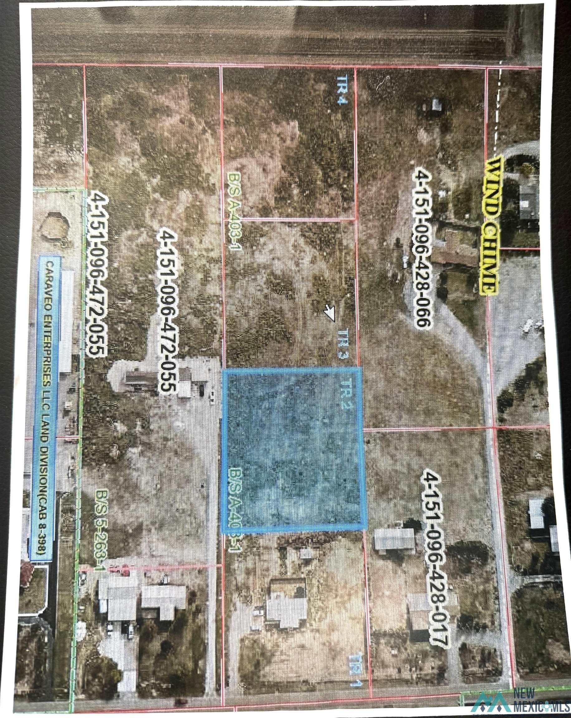 Aerial overview of property's location with property parcel outlined