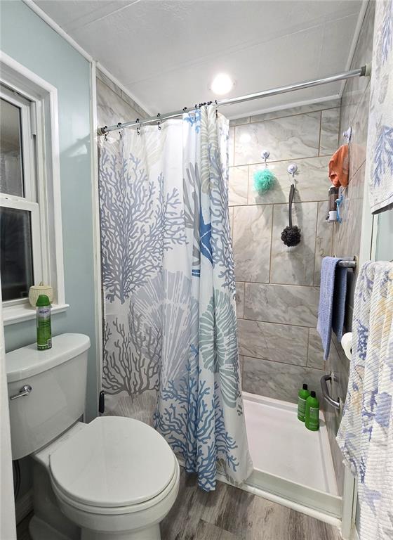 5619 Bayshore Road, Unit 435 Palmetto, FL 34221 - Photo 32 of 56 a white toilet sitting next to a bathroom sink