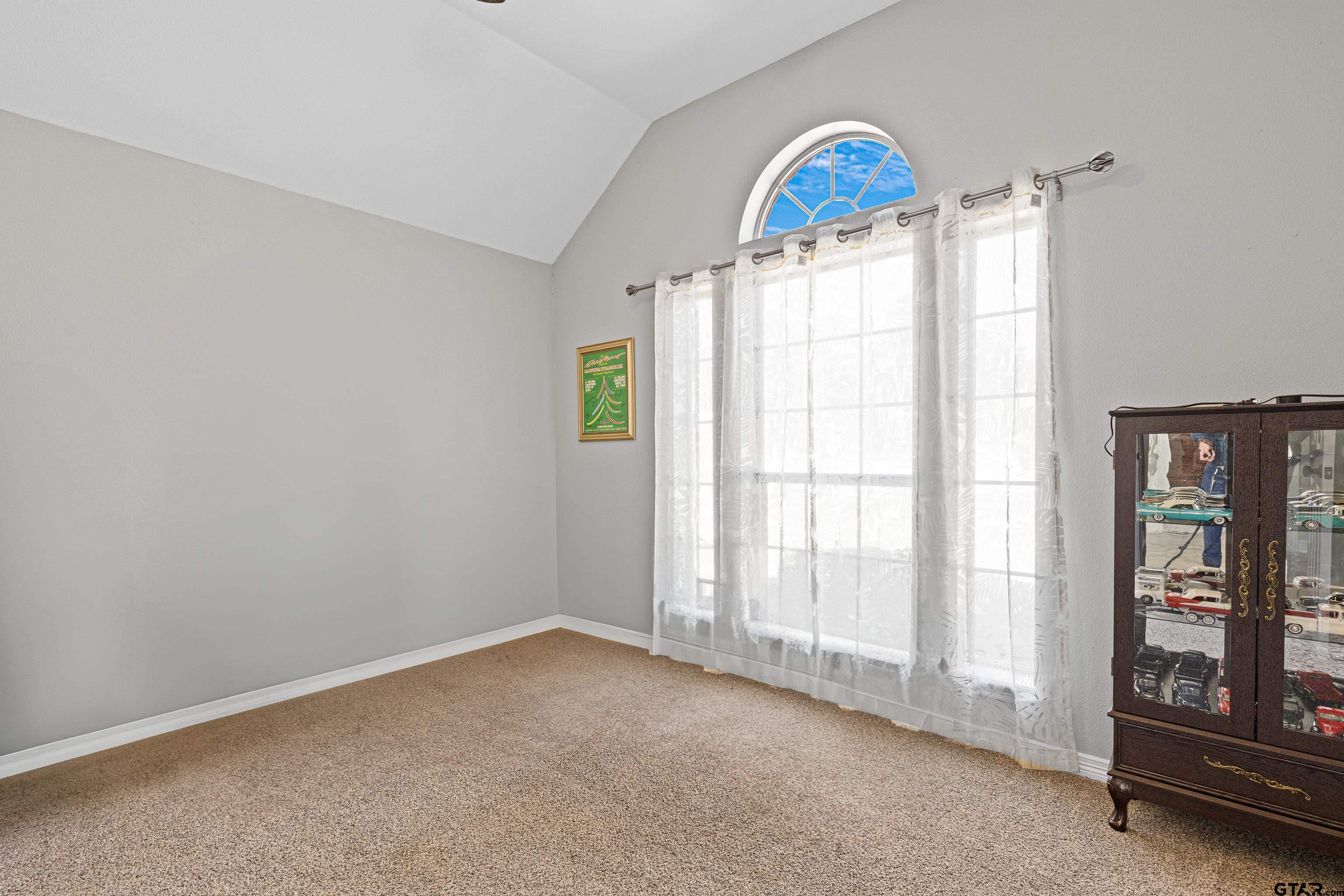 102 Fairway Street Chandler, TX 75758 - Photo 16 of 33 a view of an empty room and window