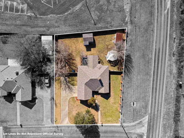 an aerial view of residential house with wooden stairs