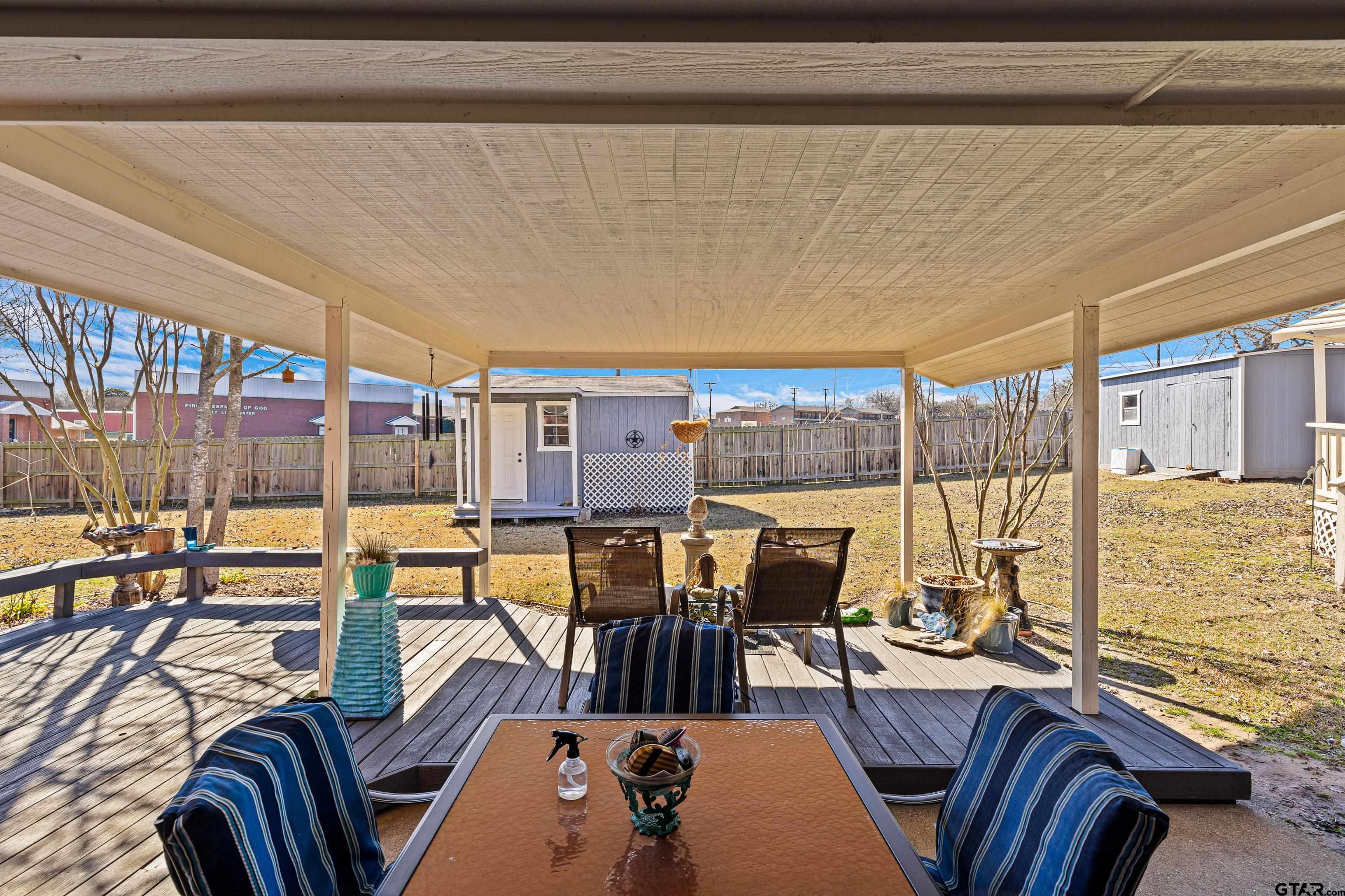 102 Fairway Street Chandler, TX 75758 - Photo 29 of 33 a view of a dining room with furniture water view and wooden floor