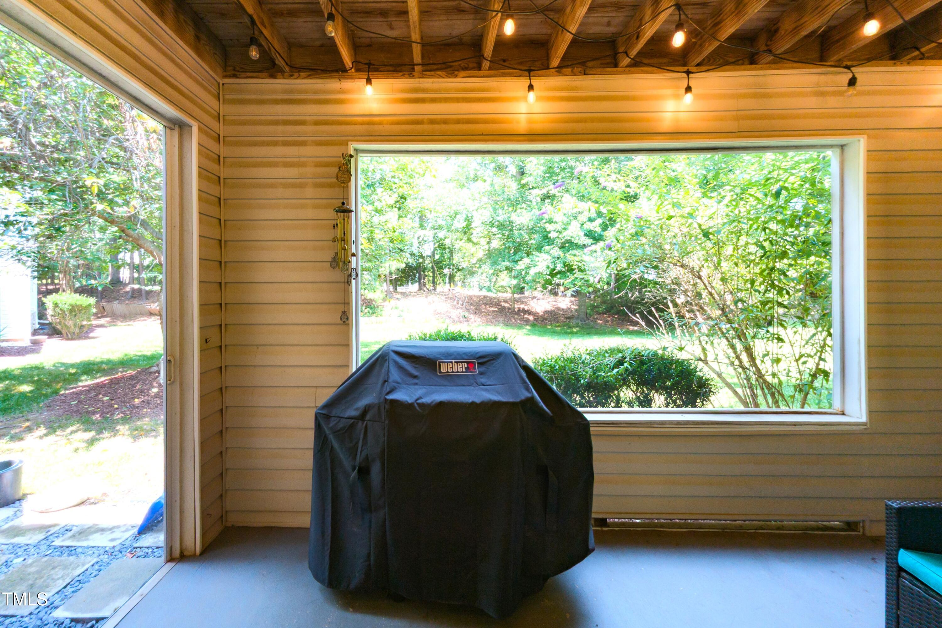 1911 Falls Landing Drive, Unit 103 Raleigh, NC 27614 - Photo 22 of 28 a view of a balcony with an outdoor space