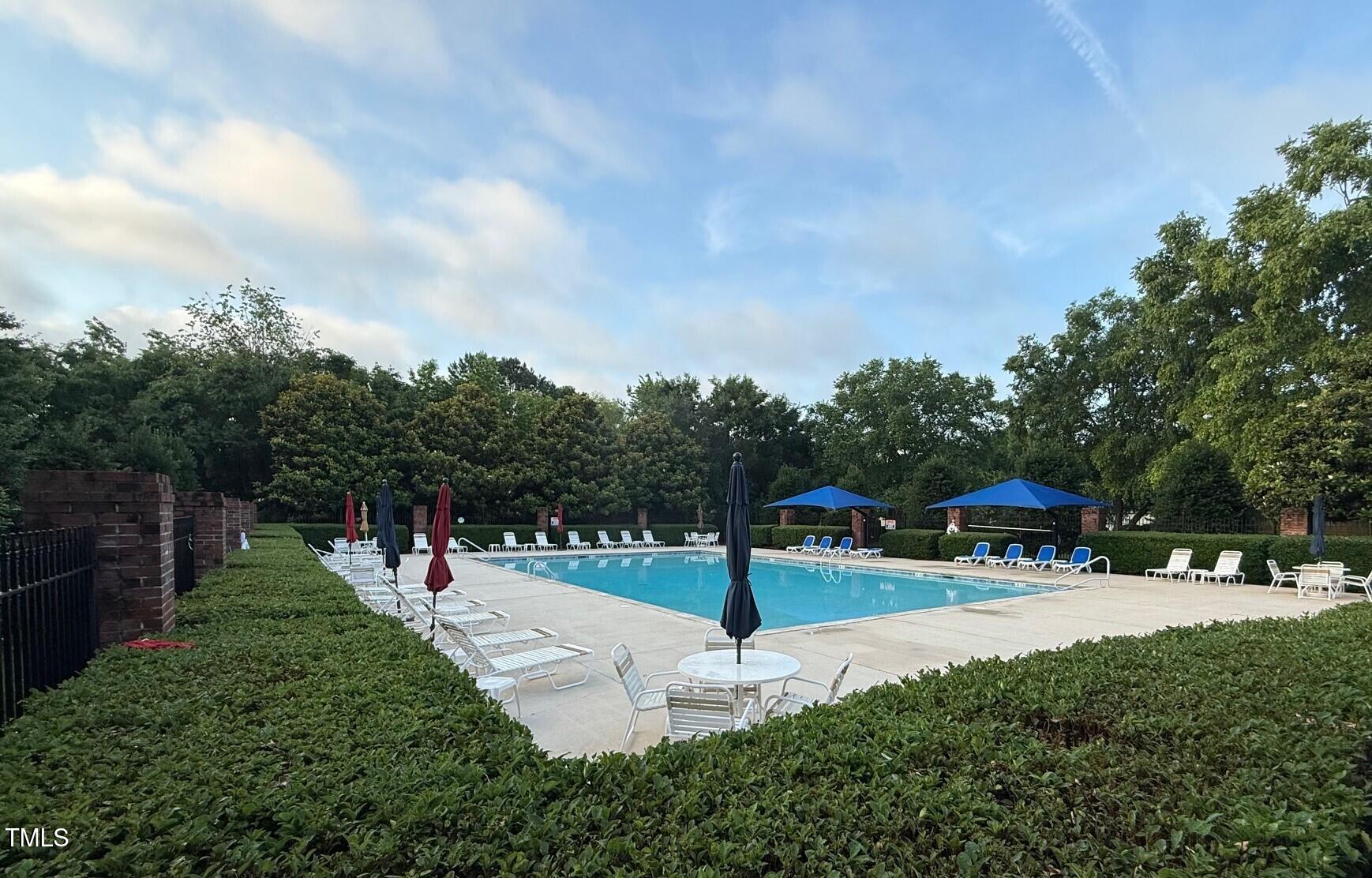 1911 Falls Landing Drive, Unit 103 Raleigh, NC 27614 - Photo 26 of 28 a view of a park with swings and slides
