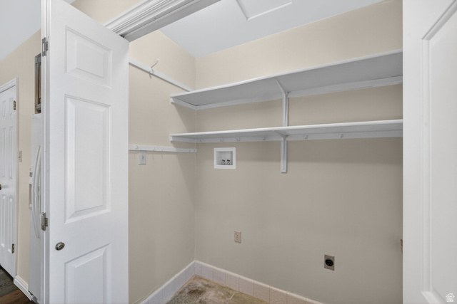 3120 North Apache Way Provo, UT 84604 - Photo 31 of 58 Dedicated laundry area featuring integrated shelving, light-toned wall paint, and floor-level electrical outlets