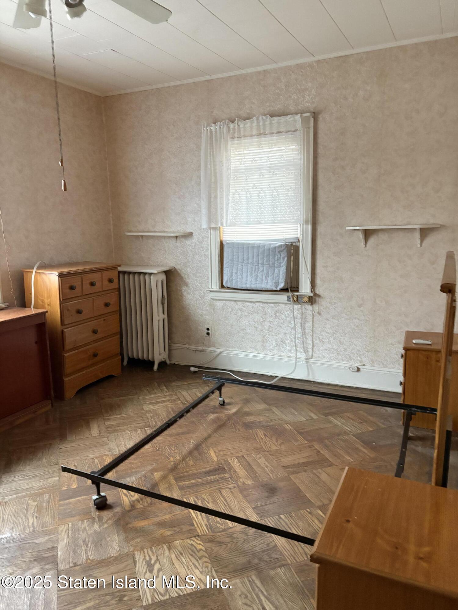 9105 Ridge Boulevard Brooklyn, NY 11209 - Photo 11 of 12 a view of a room with shelves
