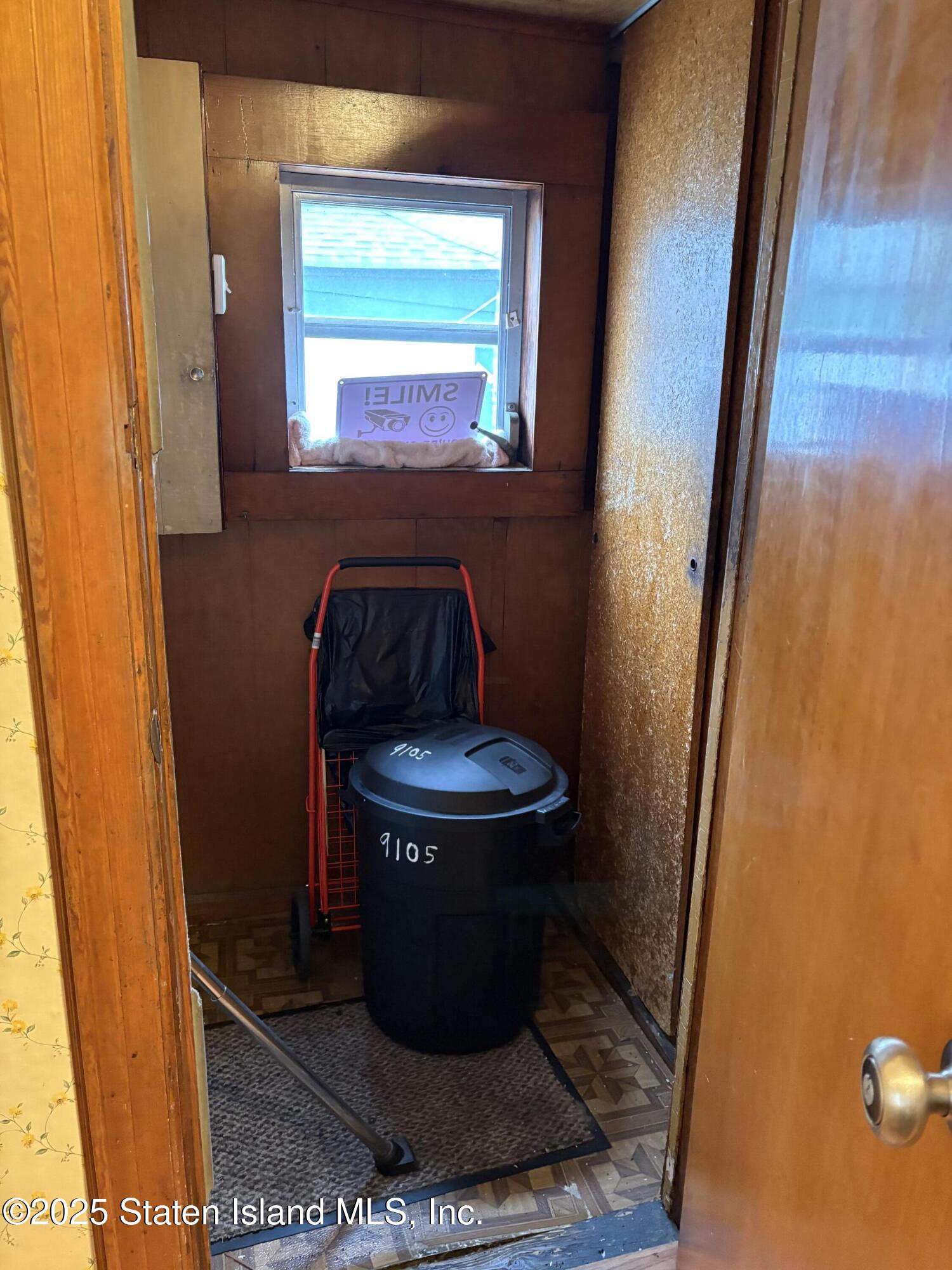 9105 Ridge Boulevard Brooklyn, NY 11209 - Photo 9 of 12 a view of a door and chair