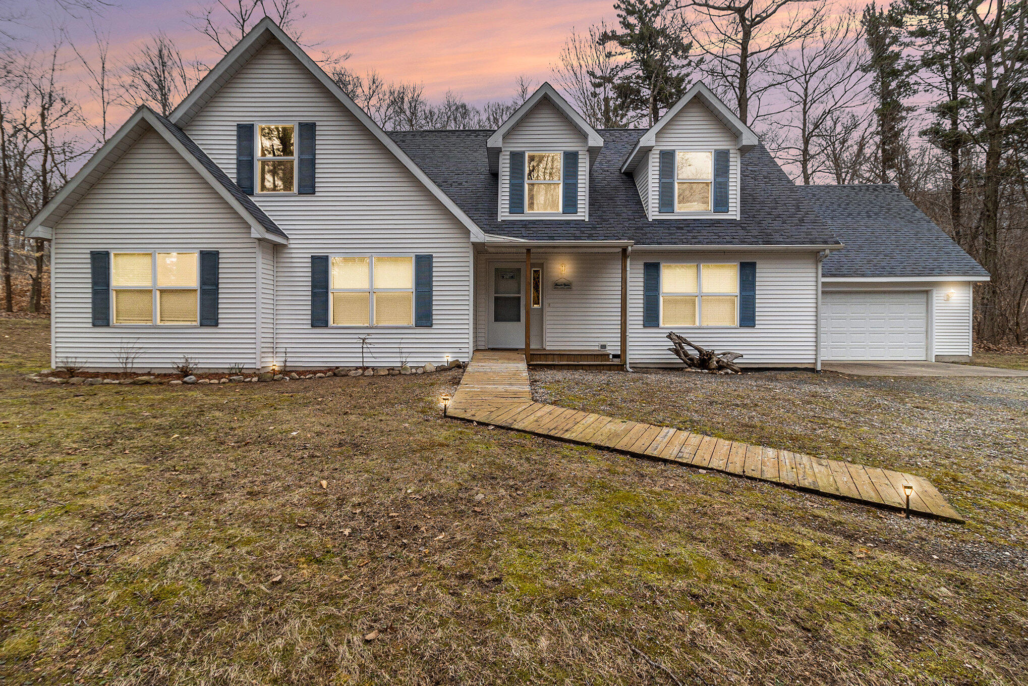 10412 West Woodrow Road Shelby, MI 49455 - Photo 1 of 29 001_5r6a9004_twilight_335