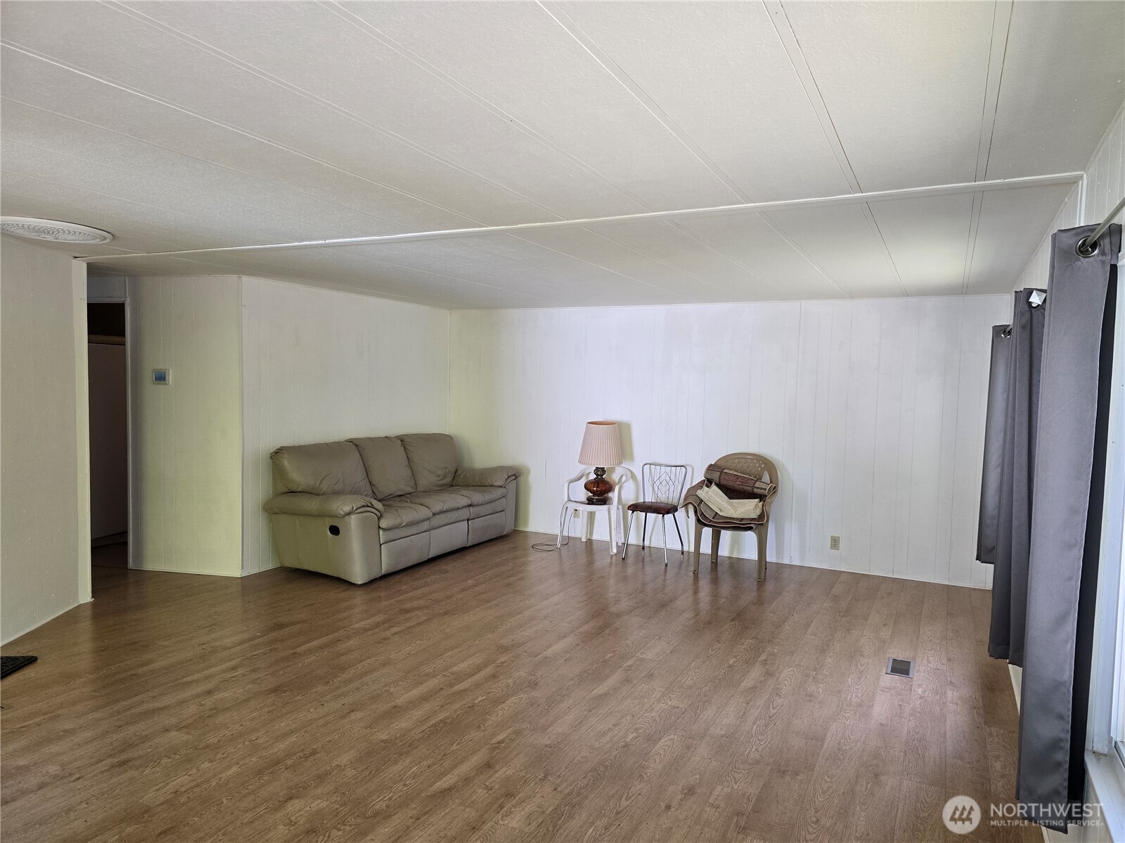 147-21 Morris Road, Unit 21 Randle, WA 98377 - Photo 22 of 31 a living room with furniture and a table