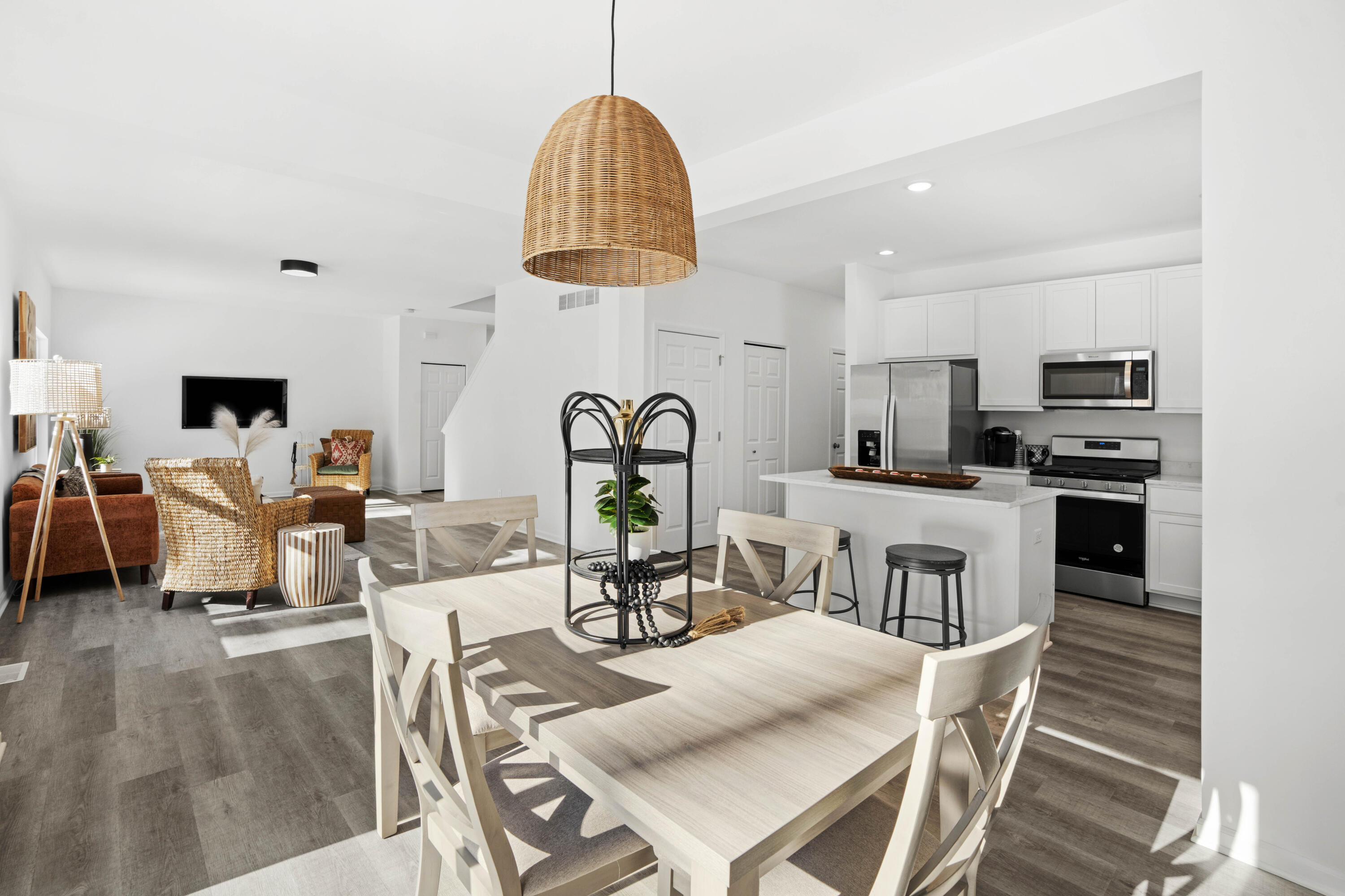 10390 California Street Crown Point, IN 46307 - Photo 11 of 26 a living room with furniture a fireplace and a flat screen tv