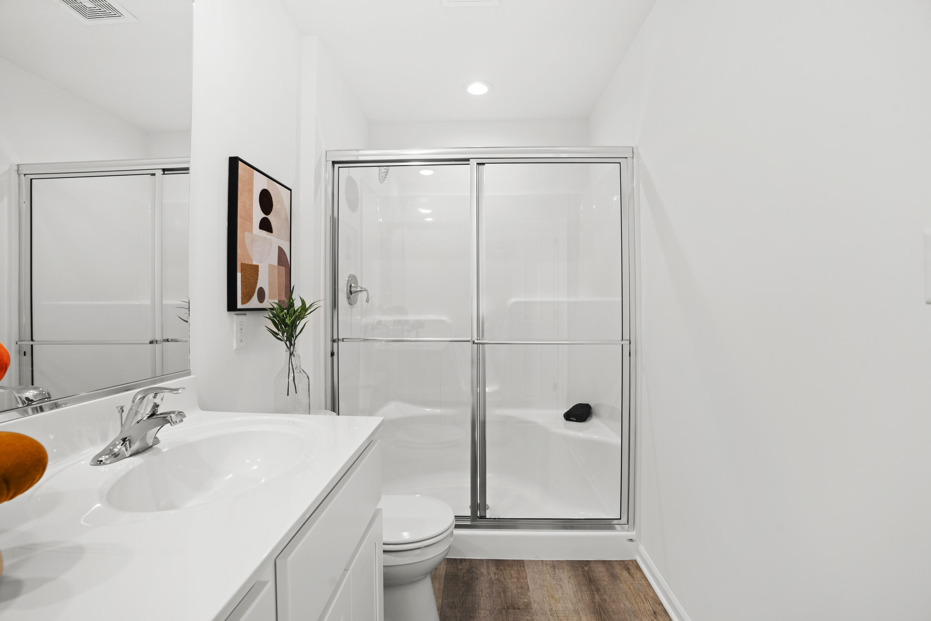 10390 California Street Crown Point, IN 46307 - Photo 22 of 26 a bathroom with a sink a toilet and shower