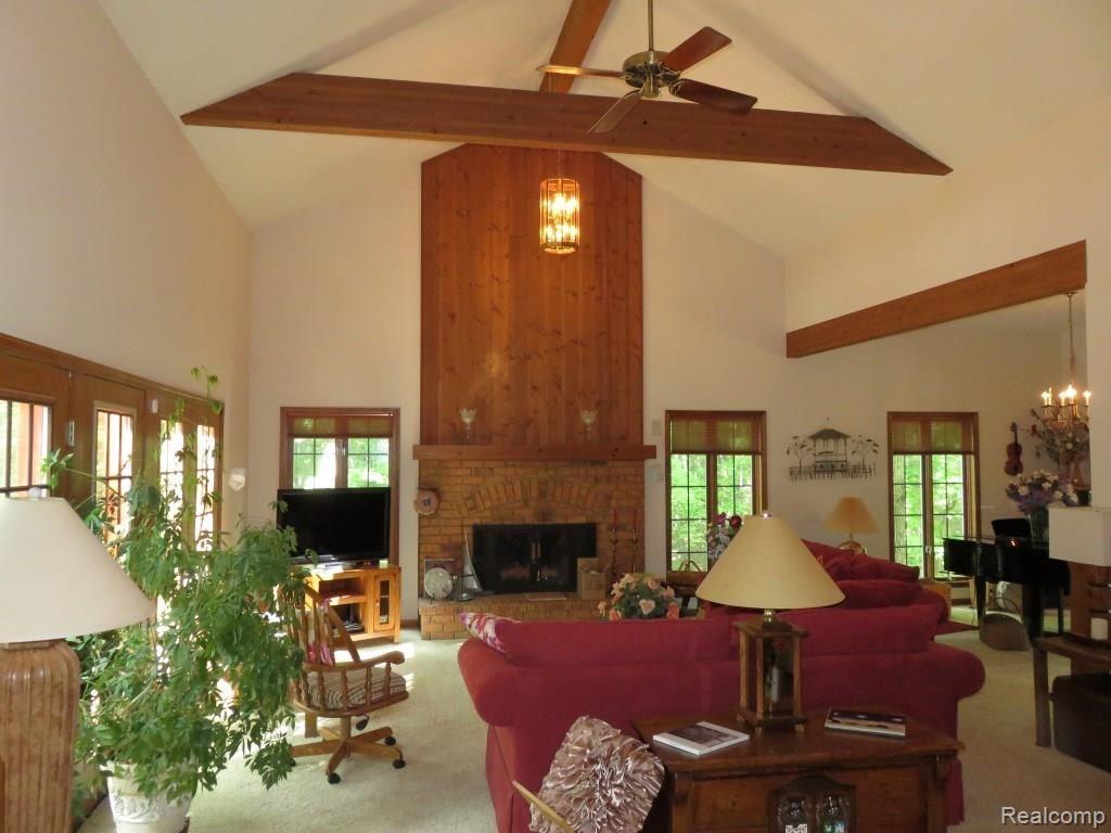 2673 Brighton Road Howell, MI 48843 - Photo 6 of 62 Great room ceiling detail & fireplace
