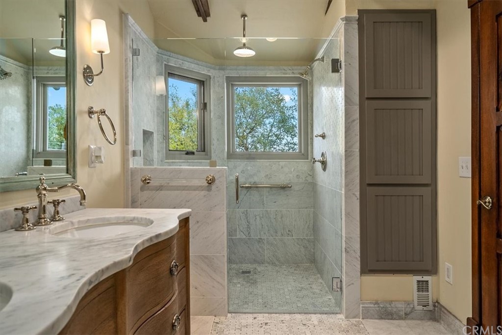 5920 Iron Gate Road Creston, CA 93432 - Photo 24 of 57 a bathroom with a granite countertop sink a shower and a mirror