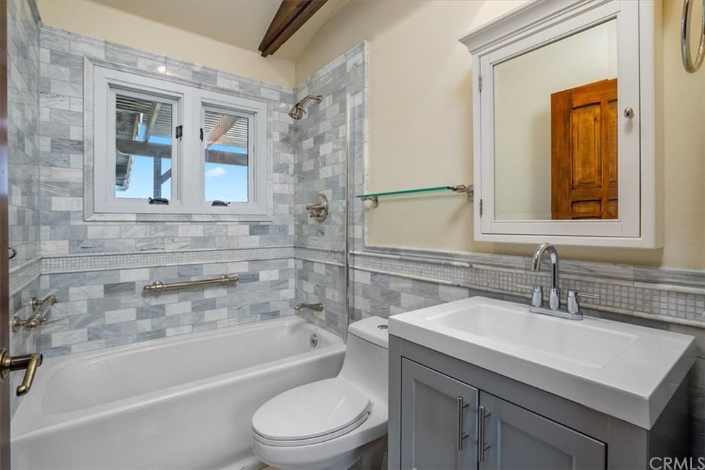 5920 Iron Gate Road Creston, CA 93432 - Photo 27 of 57 a bathroom with a sink a toilet and shower