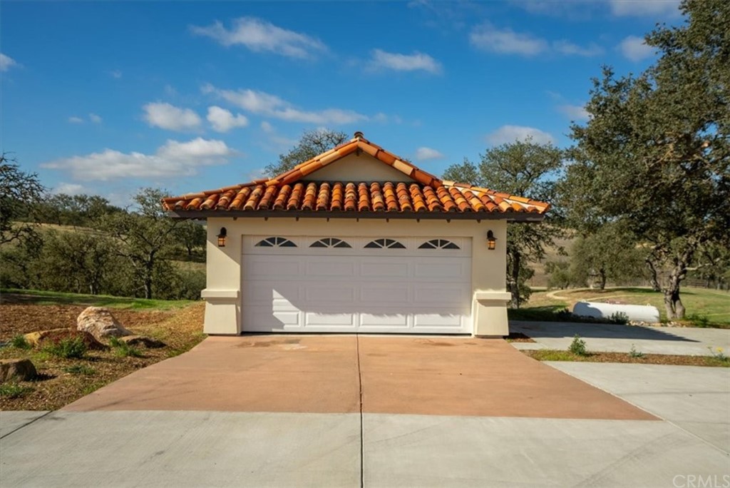 5920 Iron Gate Road Creston, CA 93432 - Photo 36 of 57 a front view of a house with a yard