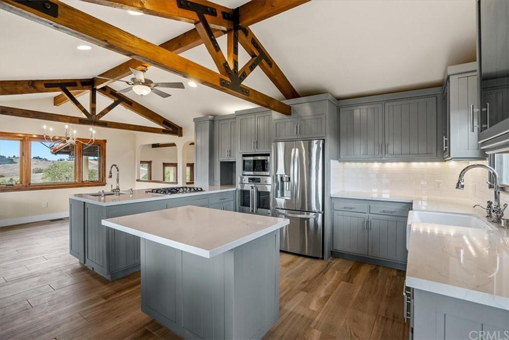 5920 Iron Gate Road Creston, CA 93432 - Photo 9 of 57 a kitchen with stainless steel appliances granite countertop a sink and a refrigerator