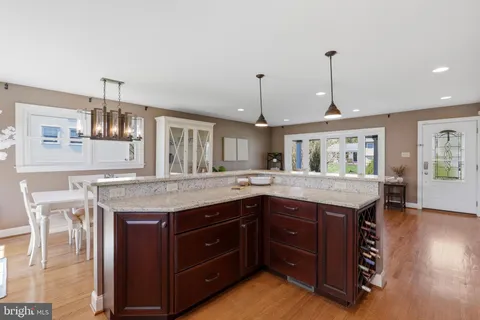 a kitchen with a stove and cabinets