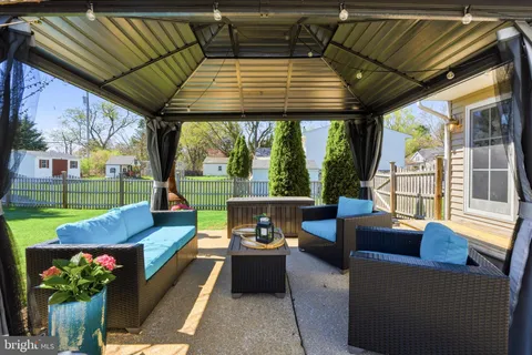a outdoor living space with furniture and garden view