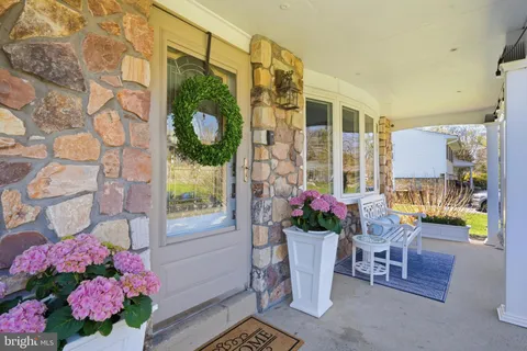 a vase of flowers sitting on a table