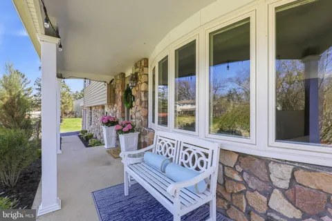 a view of porch with seating space