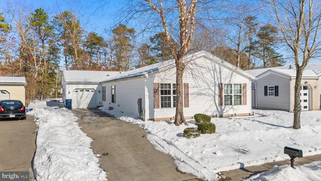 a view of a house with a snow in the snow