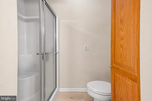 a room with bed and window