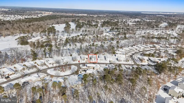 an aerial view of residential house with outdoor space