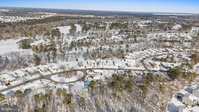 an aerial view of residential house with parking space