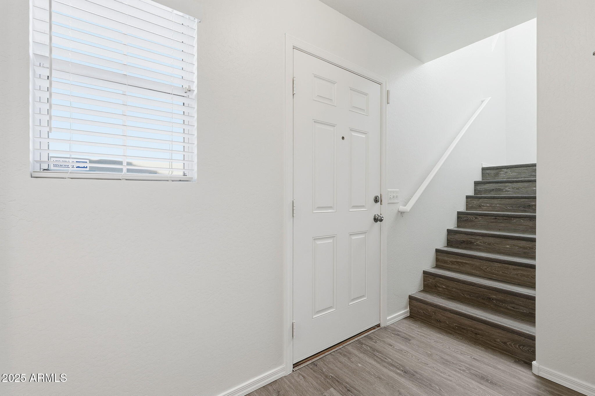 9233 East Neville Avenue, Unit 1136 Mesa, AZ 85209 - Photo 11 of 29 a view of entryway with wooden floor