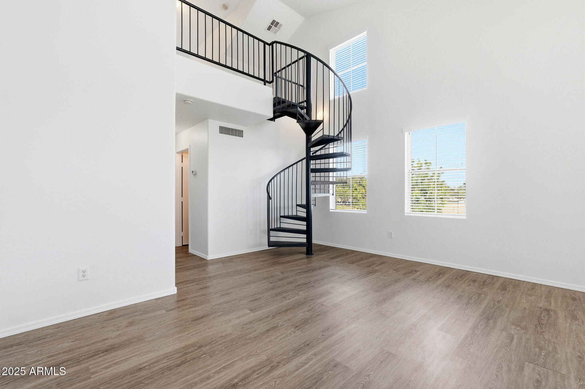 9233 East Neville Avenue, Unit 1136 Mesa, AZ 85209 - Photo 13 of 29 a view of an entryway with wooden floor