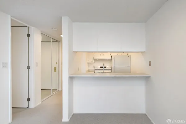 an empty room with a sliding door