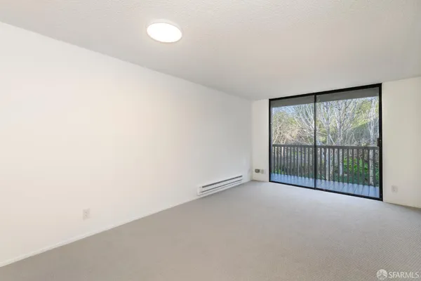 a kitchen with a sink and a refrigerator